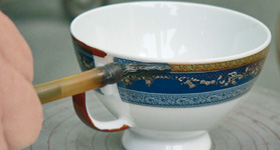Handles, decorations and borders are exclusively painted on by hand.
